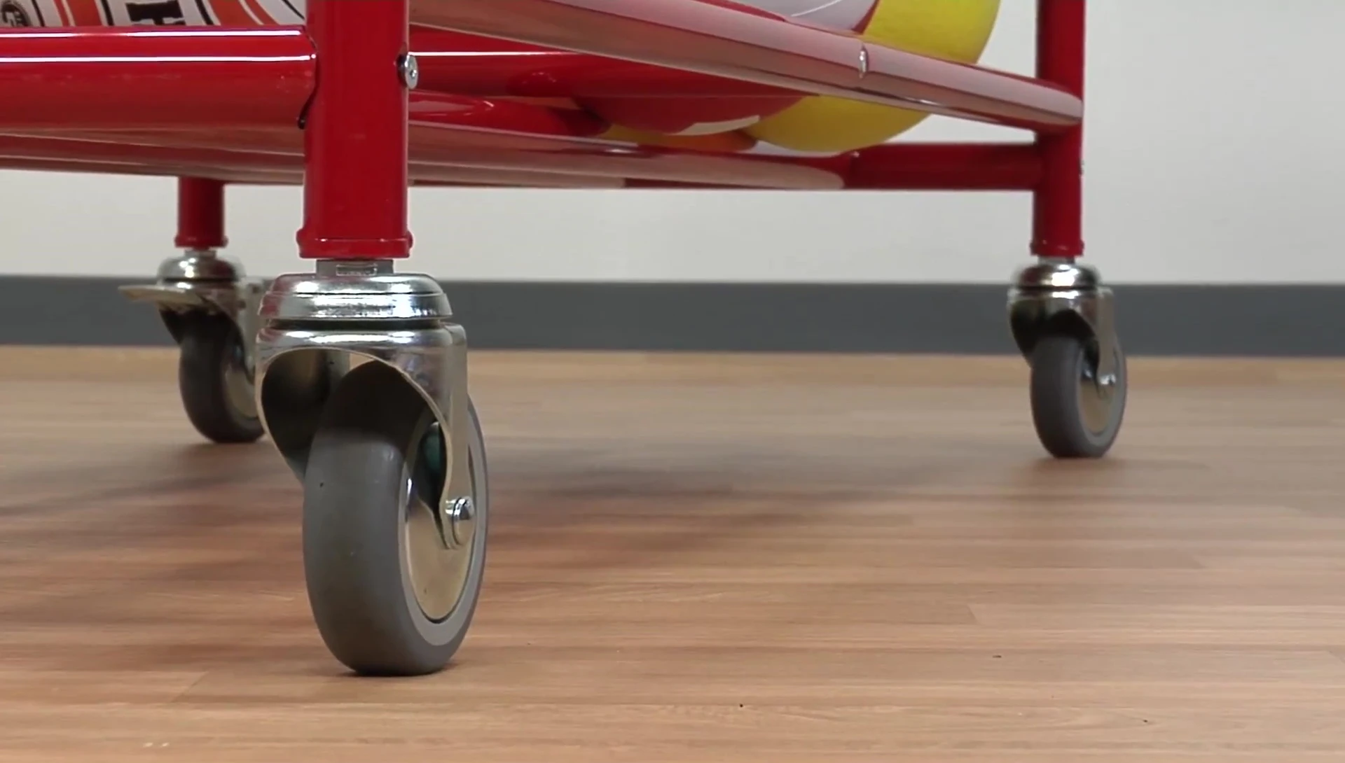 Close-up of the smooth-rolling casters in action.