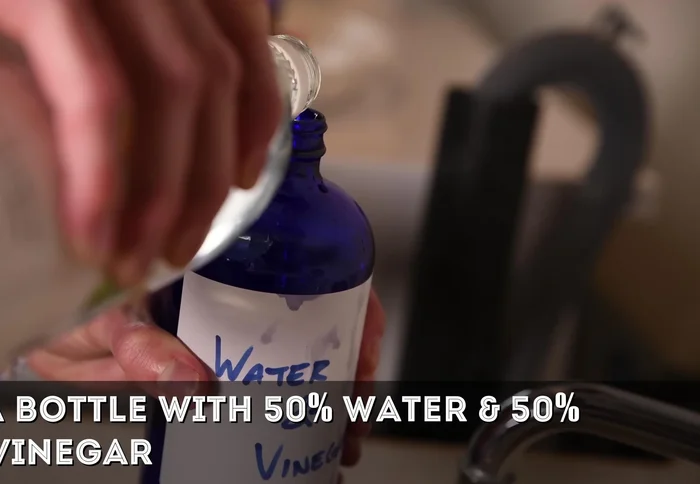 Spray again with vinegar/water solution and blot/scrub.